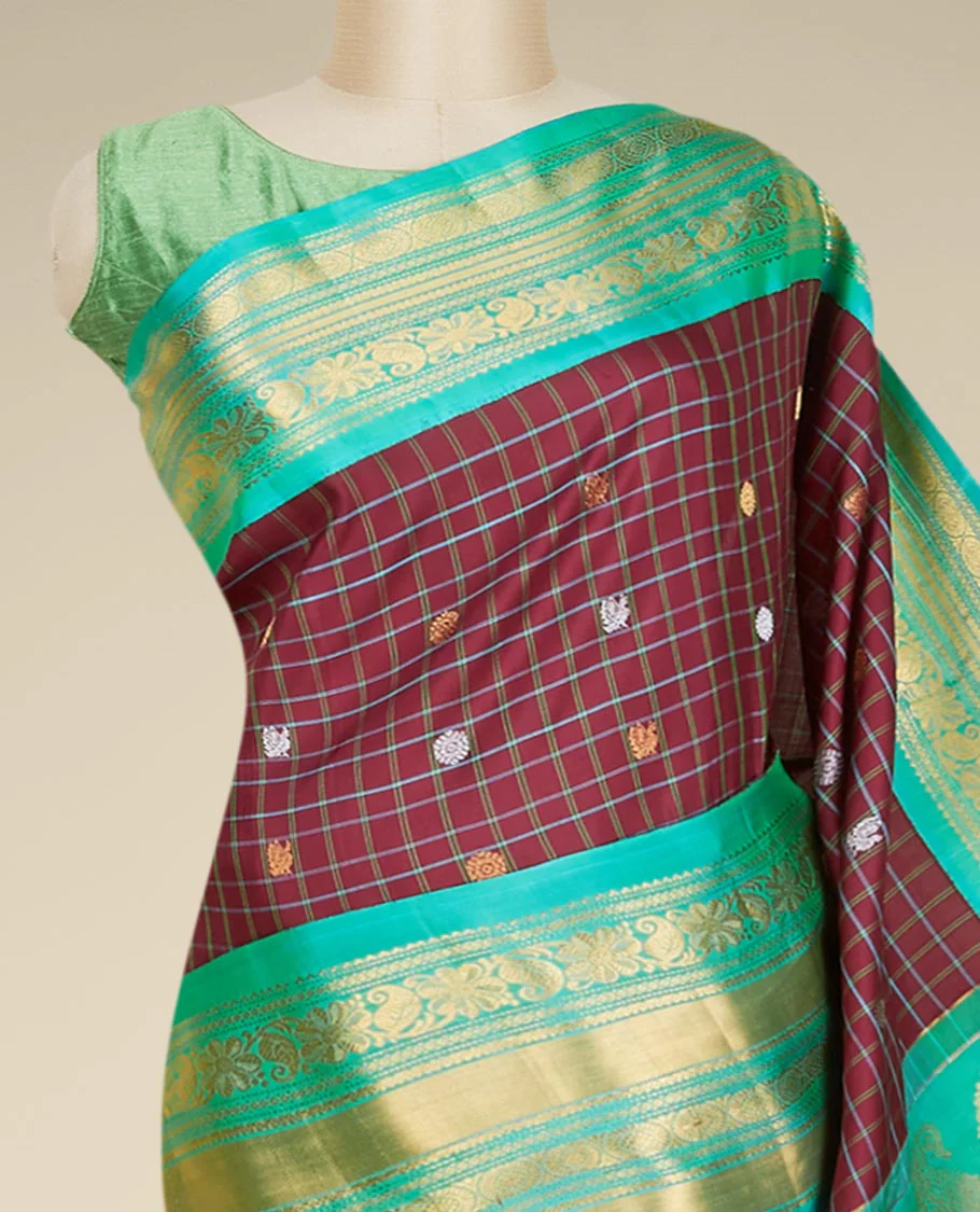 Maroon gadwal checked silksaree with mayil chakra buttas, contrast zari border & pallu of paisley, floral & argyle style - Image 3